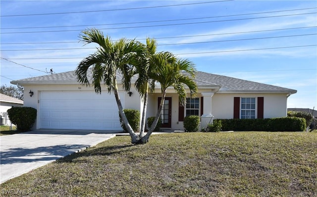 ranch-style house with a garage and a front lawn