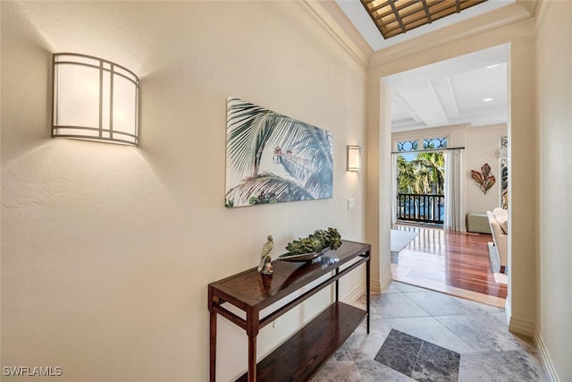 hall with tile patterned flooring