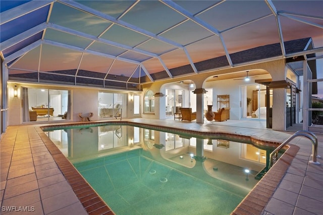 view of pool featuring a lanai and a patio area