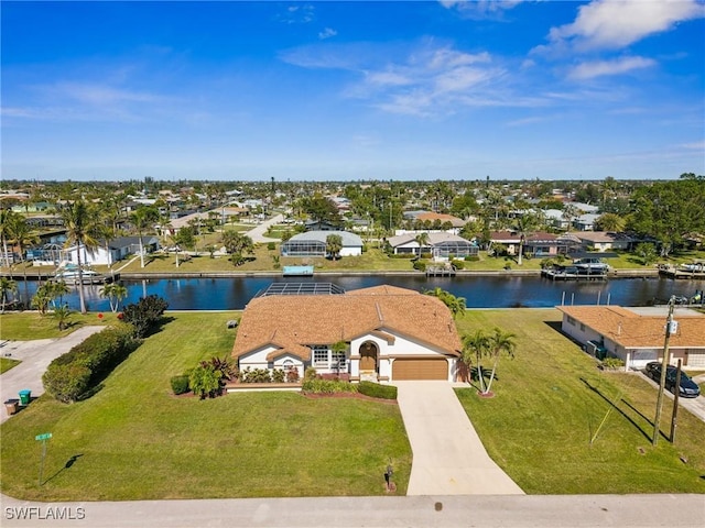 bird's eye view with a water view