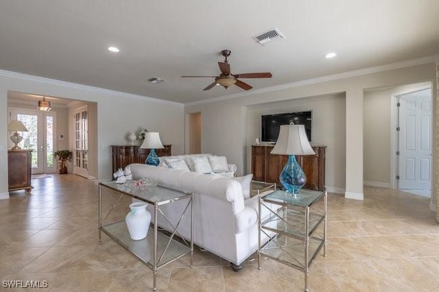 tiled living room featuring crown molding and ceiling fan