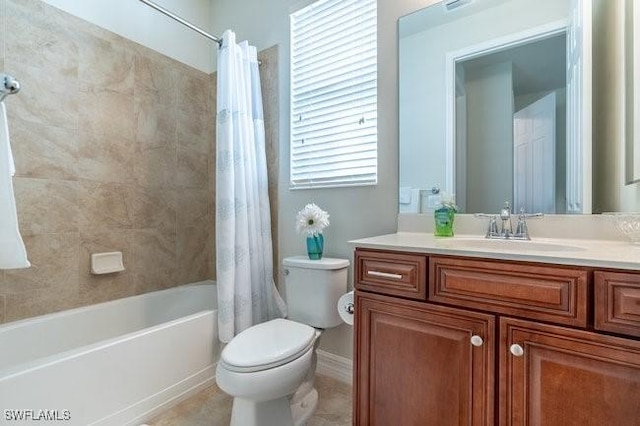 full bathroom with vanity, toilet, and shower / bath combo