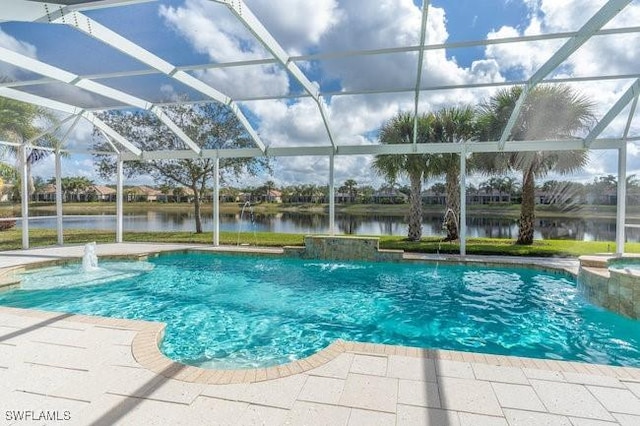 view of swimming pool featuring a patio, a lanai, pool water feature, and a water view