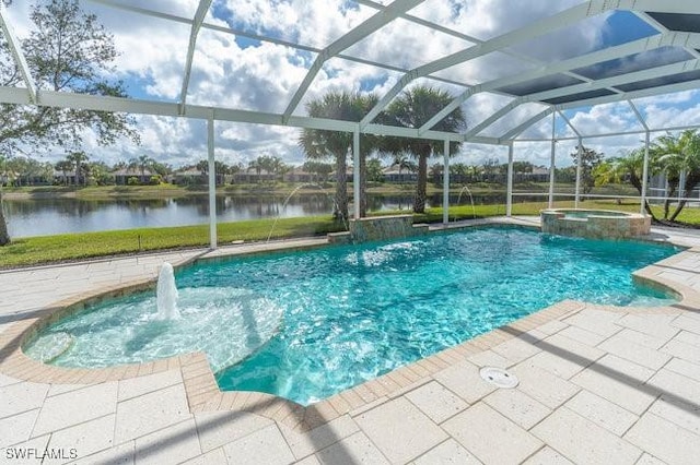 view of pool with a patio, an in ground hot tub, pool water feature, glass enclosure, and a water view