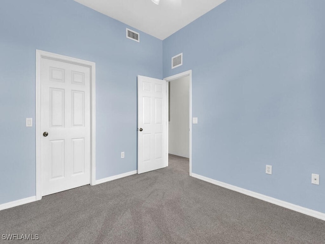 unfurnished bedroom with carpet