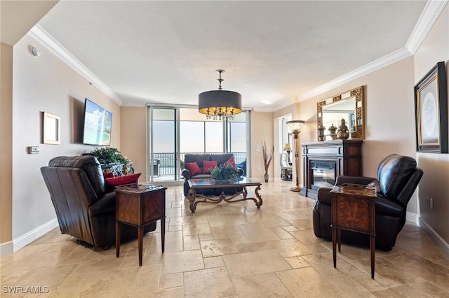 living room featuring an inviting chandelier, ornamental molding, and expansive windows