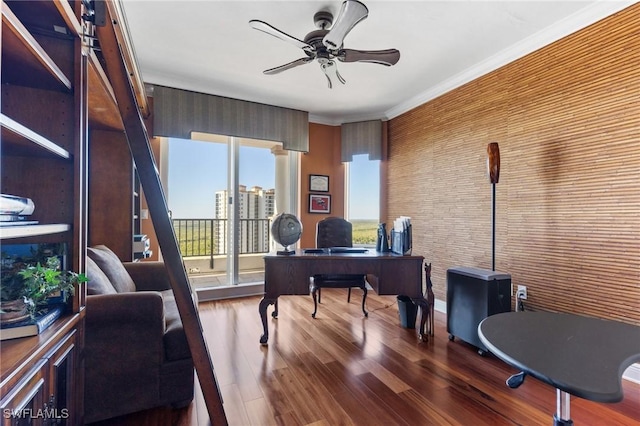 office with ornamental molding, dark hardwood / wood-style floors, and ceiling fan