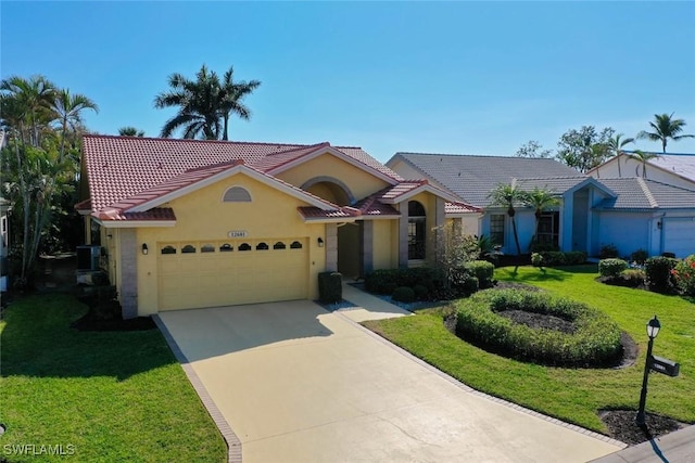 view of front facade with a garage and a front yard