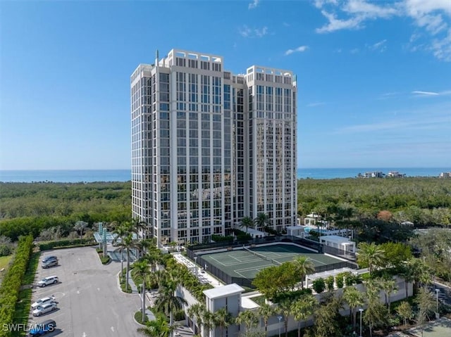 view of building exterior featuring a water view