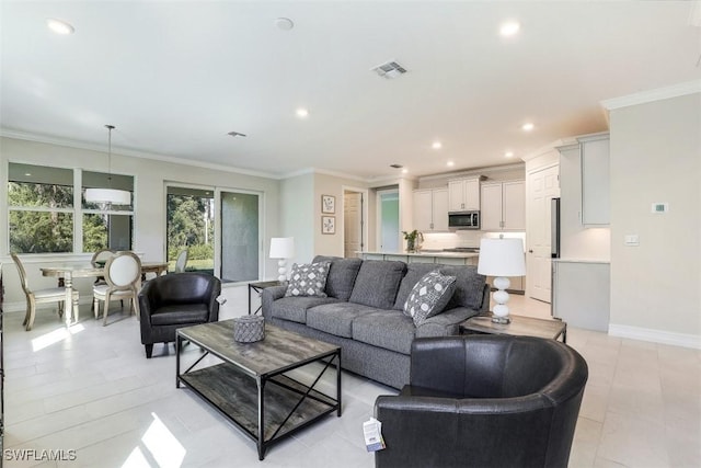 tiled living room featuring crown molding