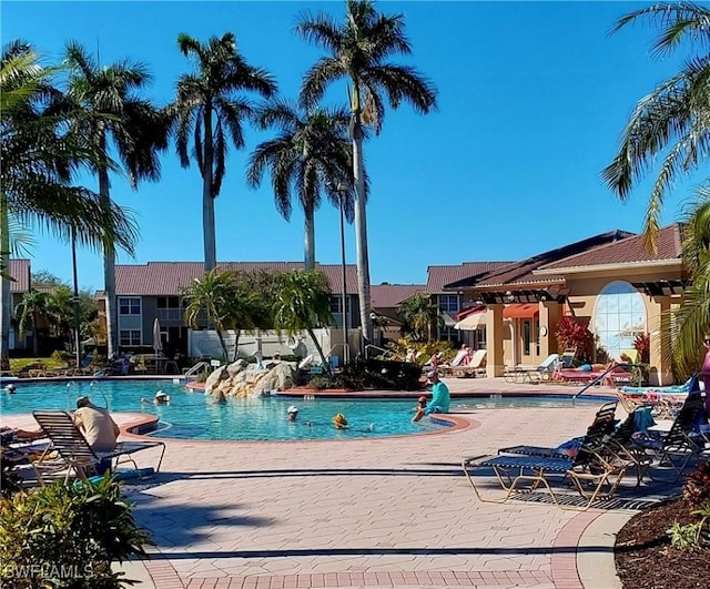 view of pool featuring a patio area