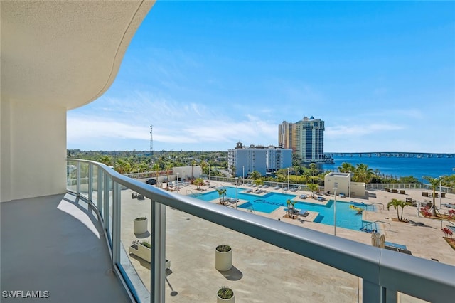 balcony featuring a water view