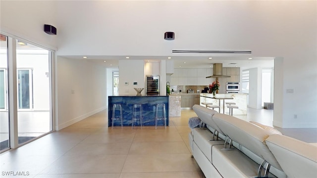 living room featuring light tile patterned floors