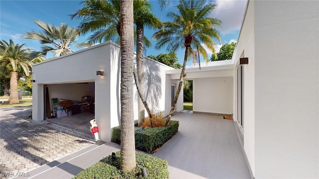 view of property exterior featuring a garage