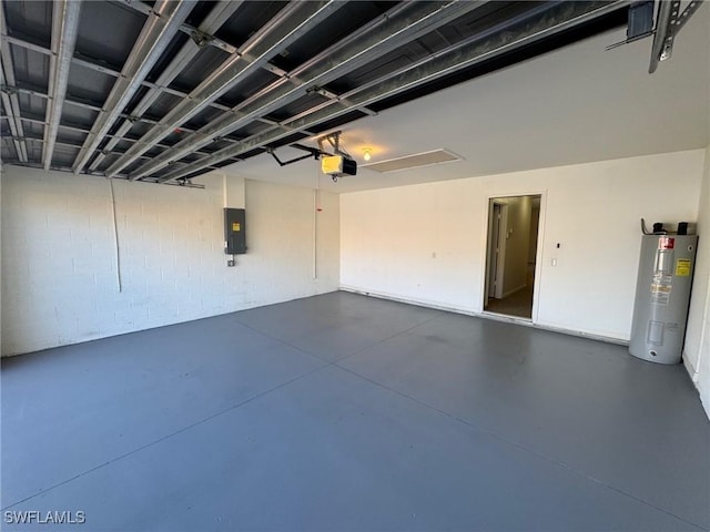 garage featuring a garage door opener, electric panel, and electric water heater