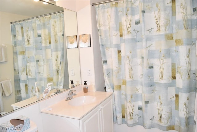 bathroom with vanity and walk in shower