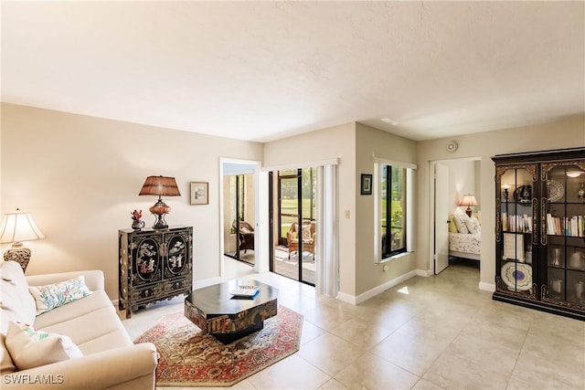 living room featuring light tile patterned flooring