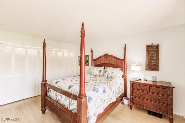 bedroom with light wood-type flooring