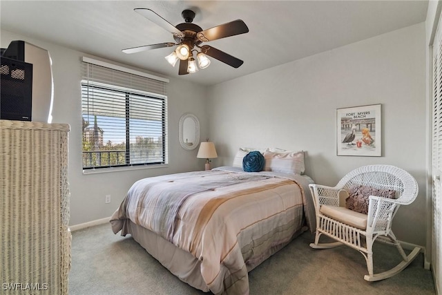 carpeted bedroom with ceiling fan