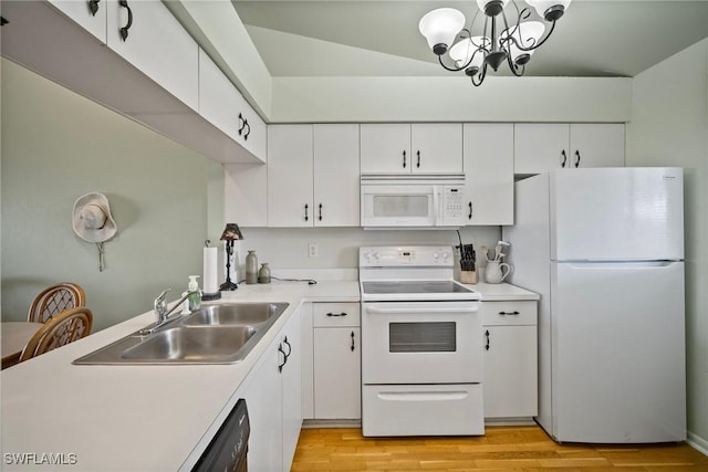 kitchen featuring sink, white appliances, light hardwood / wood-style flooring, white cabinets, and decorative light fixtures