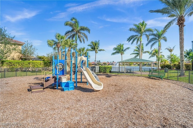 communal playground with a gazebo and fence