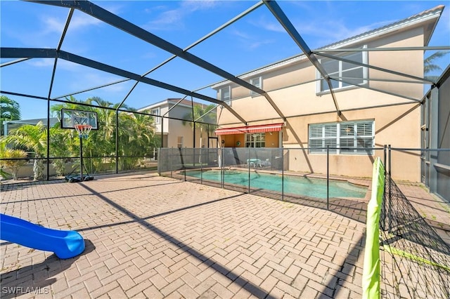 view of pool featuring a fenced in pool, a patio, and a lanai