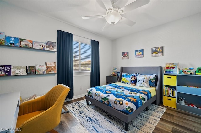 bedroom featuring ceiling fan and wood finished floors