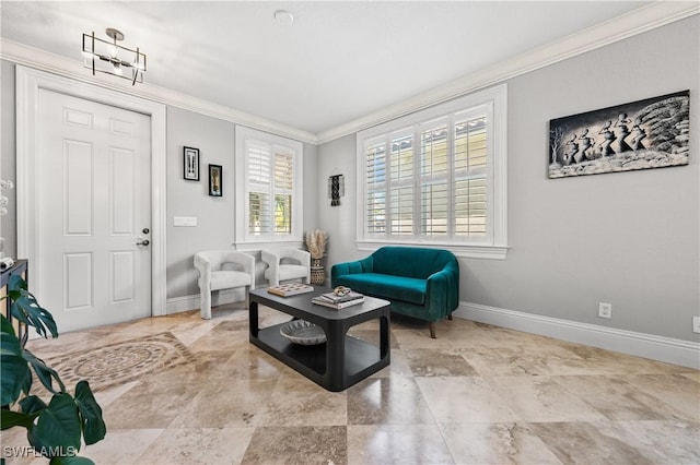 sitting room featuring baseboards and ornamental molding