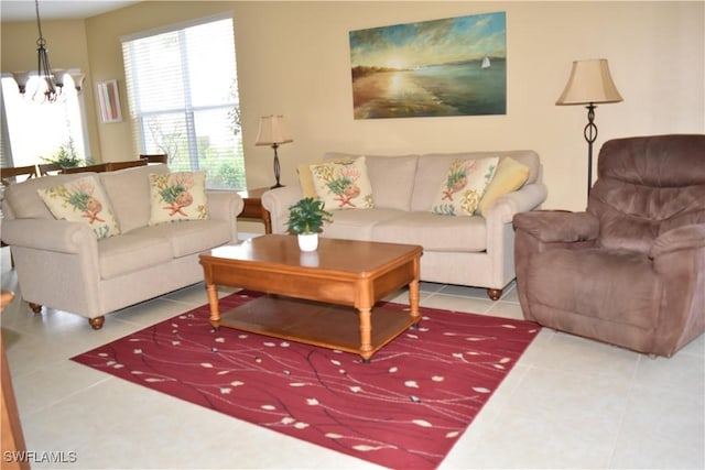 tiled living room with a chandelier