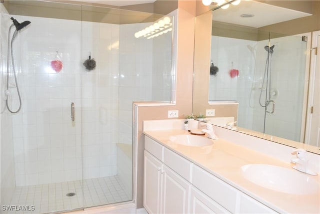 bathroom with vanity and an enclosed shower