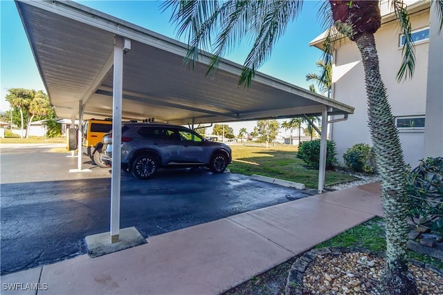 view of parking featuring a carport