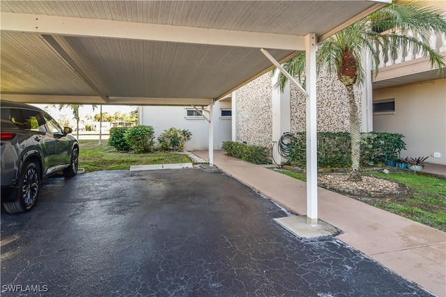 view of patio / terrace with a carport