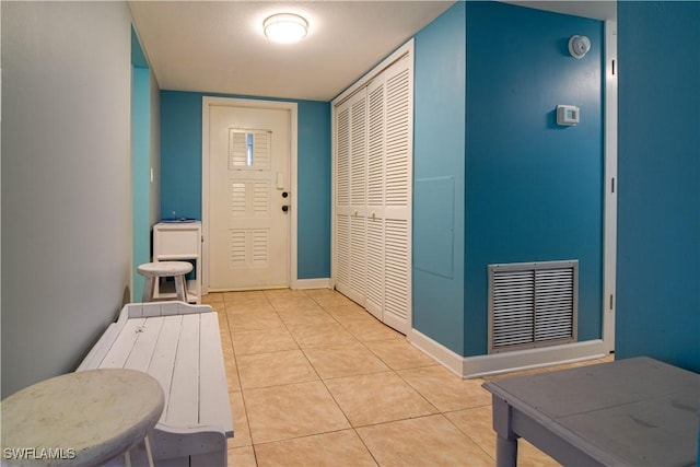 interior space featuring light tile patterned floors