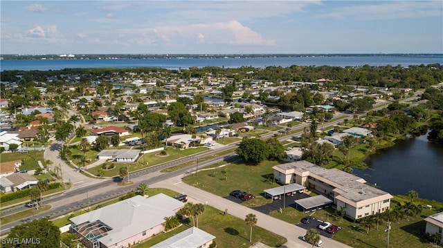 bird's eye view with a water view