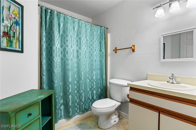 bathroom featuring vanity, a shower with curtain, and toilet