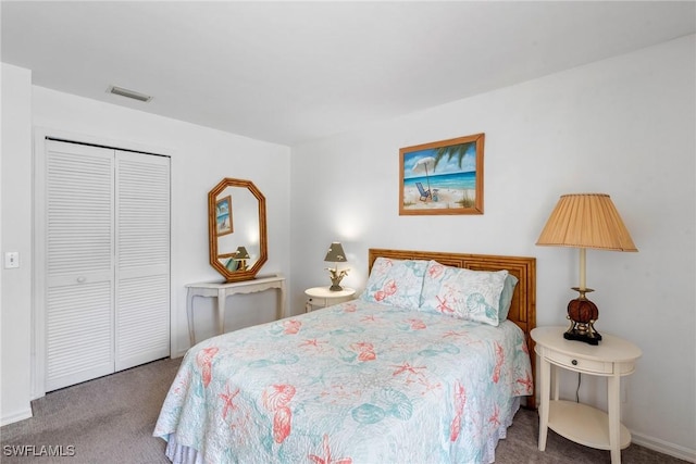 carpeted bedroom featuring a closet