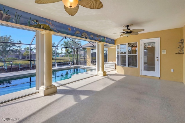 view of swimming pool featuring ceiling fan