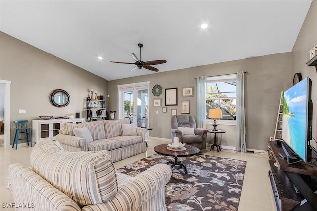 living room with lofted ceiling and ceiling fan