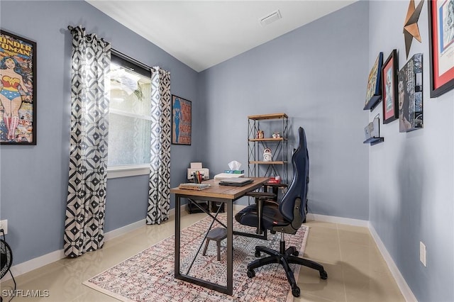 office space featuring light tile patterned floors