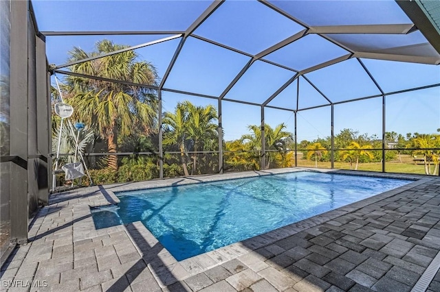 view of pool featuring a patio and a lanai