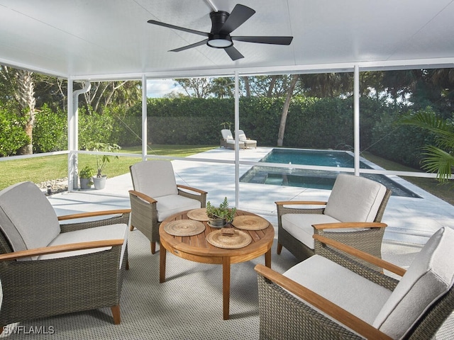 sunroom / solarium with ceiling fan