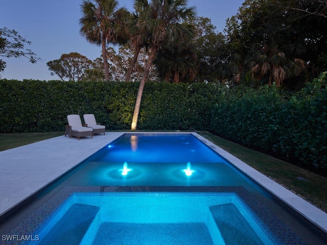 view of pool featuring a patio, a fenced backyard, and a fenced in pool