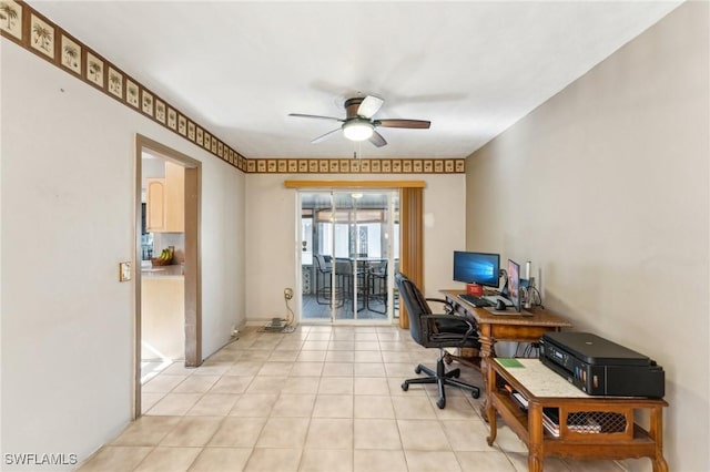 office with light tile patterned floors and ceiling fan