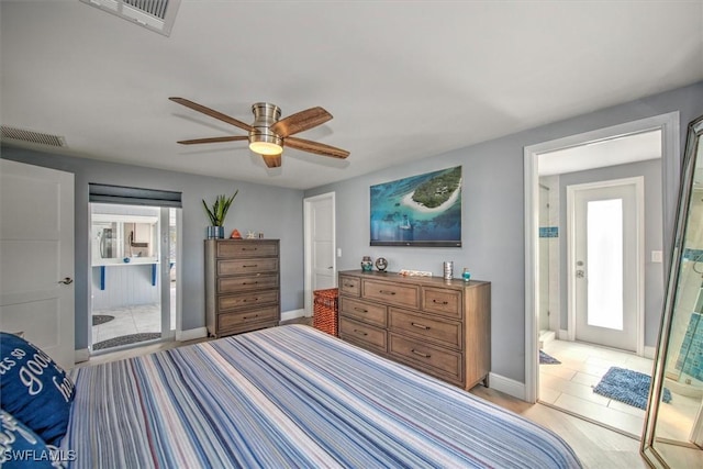 tiled bedroom featuring multiple windows and ceiling fan