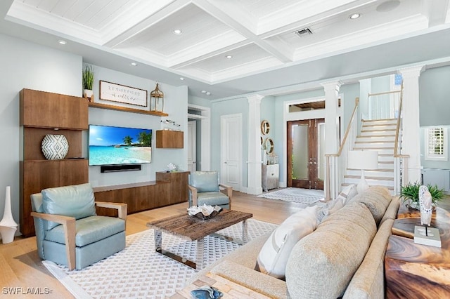 living room featuring ornate columns, beamed ceiling, ornamental molding, coffered ceiling, and light hardwood / wood-style floors