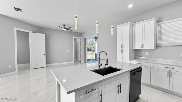 kitchen featuring decorative light fixtures, black dishwasher, sink, white cabinets, and a kitchen island with sink