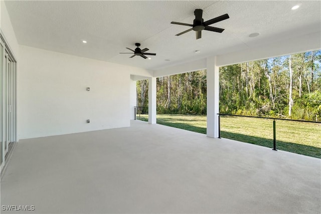view of patio featuring a ceiling fan