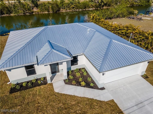 bird's eye view with a water view