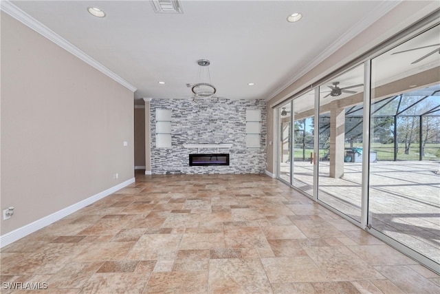 unfurnished living room featuring crown molding, a large fireplace, and ceiling fan