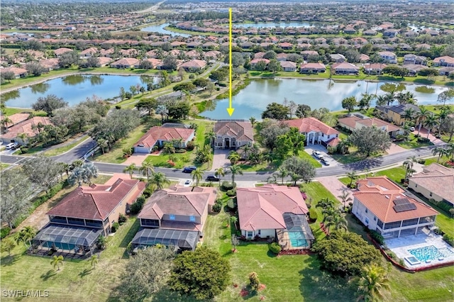 drone / aerial view featuring a water view